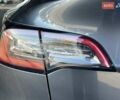 Серый Тесла Model Y, объемом двигателя 0 л и пробегом 81 тыс. км за 22099 $, фото 9 на Automoto.ua