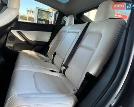 Серый Тесла Model Y, объемом двигателя 0 л и пробегом 81 тыс. км за 22099 $, фото 17 на Automoto.ua