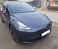 Серый Тесла Model Y, объемом двигателя 0 л и пробегом 48 тыс. км за 24900 $, фото 1 на Automoto.ua