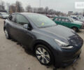 Серый Тесла Model Y, объемом двигателя 0 л и пробегом 23 тыс. км за 29999 $, фото 1 на Automoto.ua