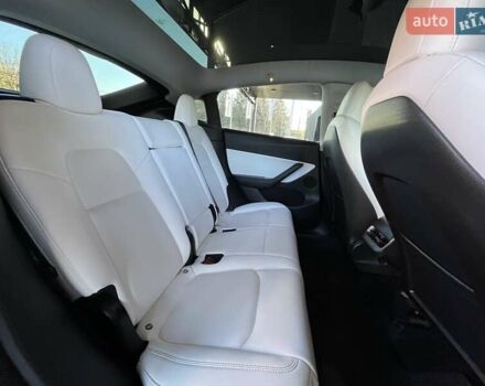 Серый Тесла Model Y, объемом двигателя 0 л и пробегом 81 тыс. км за 22099 $, фото 19 на Automoto.ua