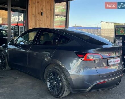 Серый Тесла Model Y, объемом двигателя 0 л и пробегом 81 тыс. км за 22099 $, фото 7 на Automoto.ua