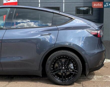Серый Тесла Model Y, объемом двигателя 0 л и пробегом 123 тыс. км за 23999 $, фото 6 на Automoto.ua