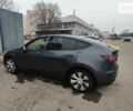 Серый Тесла Model Y, объемом двигателя 0 л и пробегом 23 тыс. км за 29999 $, фото 1 на Automoto.ua
