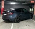 Серый Тесла Model Y, объемом двигателя 0 л и пробегом 104 тыс. км за 25490 $, фото 5 на Automoto.ua