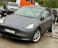 Серый Тесла Model Y, объемом двигателя 0 л и пробегом 65 тыс. км за 20400 $, фото 1 на Automoto.ua