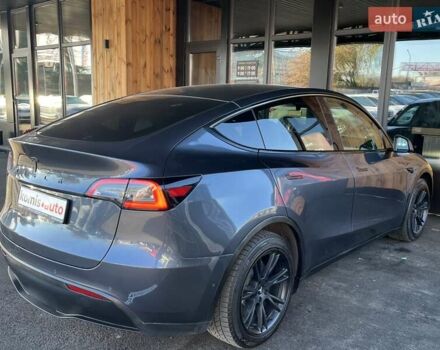 Серый Тесла Model Y, объемом двигателя 0 л и пробегом 81 тыс. км за 22099 $, фото 12 на Automoto.ua