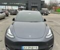 Серый Тесла Model Y, объемом двигателя 0 л и пробегом 19 тыс. км за 27000 $, фото 1 на Automoto.ua