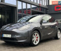 Серый Тесла Model Y, объемом двигателя 0 л и пробегом 92 тыс. км за 23500 $, фото 1 на Automoto.ua
