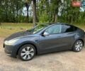 Серый Тесла Model Y, объемом двигателя 0 л и пробегом 52 тыс. км за 34000 $, фото 2 на Automoto.ua