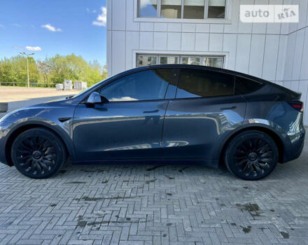 Серый Тесла Model Y, объемом двигателя 0 л и пробегом 57 тыс. км за 32900 $, фото 2 на Automoto.ua