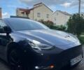 Серый Тесла Model Y, объемом двигателя 0 л и пробегом 83 тыс. км за 21499 $, фото 1 на Automoto.ua