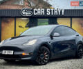 Серый Тесла Model Y, объемом двигателя 0 л и пробегом 107 тыс. км за 23999 $, фото 1 на Automoto.ua