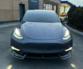 Серый Тесла Model Y, объемом двигателя 0 л и пробегом 49 тыс. км за 26500 $, фото 1 на Automoto.ua