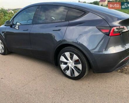 Серый Тесла Model Y, объемом двигателя 0 л и пробегом 77 тыс. км за 22700 $, фото 2 на Automoto.ua