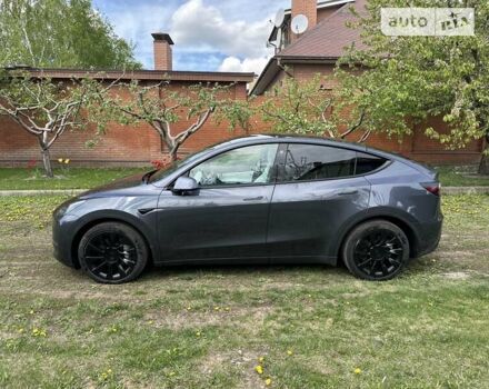 Серый Тесла Model Y, объемом двигателя 0 л и пробегом 28 тыс. км за 34900 $, фото 2 на Automoto.ua