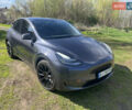 Серый Тесла Model Y, объемом двигателя 0 л и пробегом 68 тыс. км за 33000 $, фото 1 на Automoto.ua