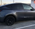 Серый Тесла Model Y, объемом двигателя 0 л и пробегом 25 тыс. км за 20500 $, фото 1 на Automoto.ua