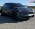 Серый Тесла Model Y, объемом двигателя 0 л и пробегом 44 тыс. км за 26000 $, фото 1 на Automoto.ua
