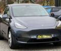 Серый Тесла Model Y, объемом двигателя 75 л и пробегом 60 тыс. км за 32200 $, фото 1 на Automoto.ua