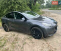 Серый Тесла Model Y, объемом двигателя 0 л и пробегом 61 тыс. км за 29000 $, фото 1 на Automoto.ua