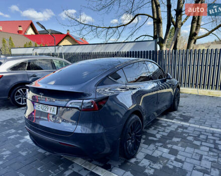 Серый Тесла Model Y, объемом двигателя 0 л и пробегом 78 тыс. км за 28000 $, фото 1 на Automoto.ua