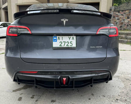 Серый Тесла Model Y, объемом двигателя 0 л и пробегом 95 тыс. км за 25000 $, фото 5 на Automoto.ua