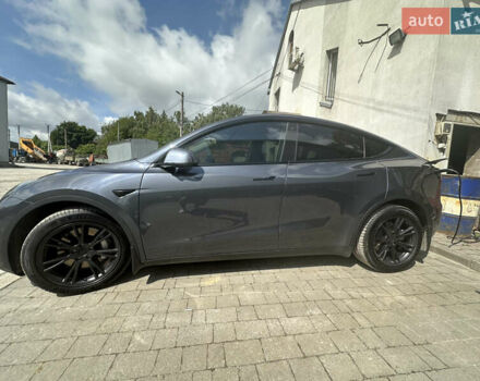 Серый Тесла Model Y, объемом двигателя 0 л и пробегом 55 тыс. км за 29000 $, фото 4 на Automoto.ua