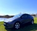 Серый Тесла Model Y, объемом двигателя 0.32 л и пробегом 100 тыс. км за 18999 $, фото 1 на Automoto.ua