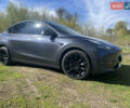Серый Тесла Model Y, объемом двигателя 0 л и пробегом 68 тыс. км за 33000 $, фото 1 на Automoto.ua