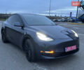 Серый Тесла Model Y, объемом двигателя 0 л и пробегом 110 тыс. км за 23700 $, фото 1 на Automoto.ua