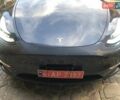 Серый Тесла Model Y, объемом двигателя 0 л и пробегом 77 тыс. км за 22700 $, фото 3 на Automoto.ua