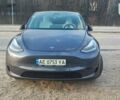 Серый Тесла Model Y, объемом двигателя 0 л и пробегом 61 тыс. км за 22900 $, фото 2 на Automoto.ua