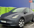 Серый Тесла Model Y, объемом двигателя 0 л и пробегом 76 тыс. км за 23900 $, фото 1 на Automoto.ua