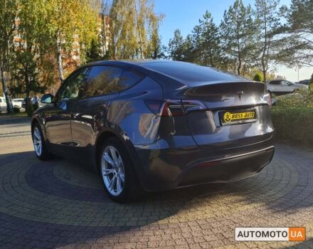 Сірий Тесла Model Y, об'ємом двигуна 65 л та пробігом 80 тис. км за 31800 $, фото 4 на Automoto.ua