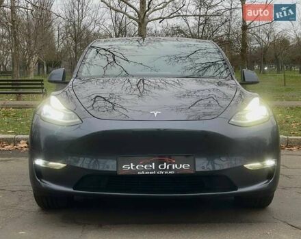 Серый Тесла Model Y, объемом двигателя 0 л и пробегом 92 тыс. км за 24499 $, фото 1 на Automoto.ua