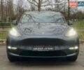 Серый Тесла Model Y, объемом двигателя 0 л и пробегом 92 тыс. км за 24499 $, фото 1 на Automoto.ua