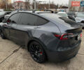 Серый Тесла Model Y, объемом двигателя 0 л и пробегом 98 тыс. км за 29490 $, фото 3 на Automoto.ua