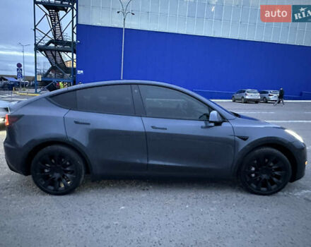 Серый Тесла Model Y, объемом двигателя 0 л и пробегом 110 тыс. км за 23700 $, фото 2 на Automoto.ua