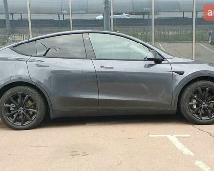 Серый Тесла Model Y, объемом двигателя 0 л и пробегом 84 тыс. км за 24999 $, фото 6 на Automoto.ua