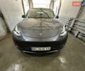 Серый Тесла Model Y, объемом двигателя 0 л и пробегом 55 тыс. км за 29000 $, фото 1 на Automoto.ua