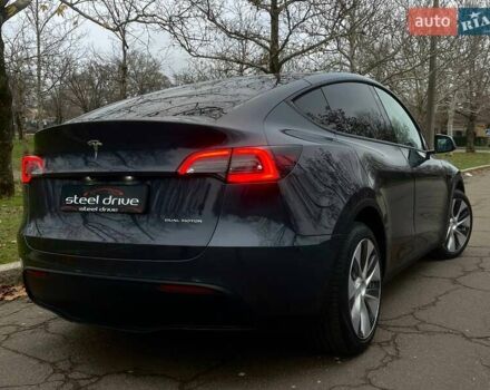 Серый Тесла Model Y, объемом двигателя 0 л и пробегом 92 тыс. км за 24499 $, фото 4 на Automoto.ua