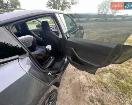 Серый Тесла Model Y, объемом двигателя 0 л и пробегом 61 тыс. км за 29000 $, фото 18 на Automoto.ua