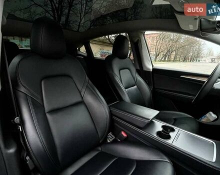 Серый Тесла Model Y, объемом двигателя 0 л и пробегом 92 тыс. км за 24499 $, фото 13 на Automoto.ua