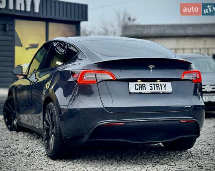 Серый Тесла Model Y, объемом двигателя 0 л и пробегом 107 тыс. км за 23999 $, фото 2 на Automoto.ua