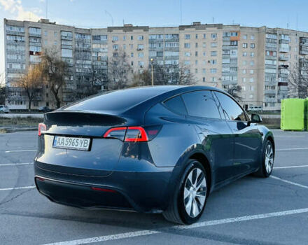 Серый Тесла Model Y, объемом двигателя 0 л и пробегом 100 тыс. км за 26000 $, фото 4 на Automoto.ua