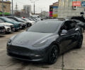 Серый Тесла Model Y, объемом двигателя 0 л и пробегом 98 тыс. км за 29490 $, фото 1 на Automoto.ua