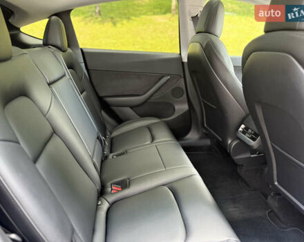 Серый Тесла Model Y, объемом двигателя 0 л и пробегом 42 тыс. км за 29900 $, фото 14 на Automoto.ua