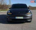 Серый Тесла Model Y, объемом двигателя 0 л и пробегом 44 тыс. км за 26000 $, фото 1 на Automoto.ua