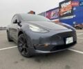 Серый Тесла Model Y, объемом двигателя 0 л и пробегом 56 тыс. км за 23950 $, фото 2 на Automoto.ua